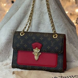 Louis Vuitton Victoire Handbag Monogram Canvas and Leather